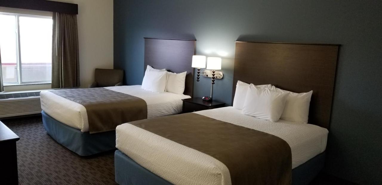 Queen Room with Two Queen Beds - Non-Smoking at AmericInn by Wyndham Sioux Falls North
