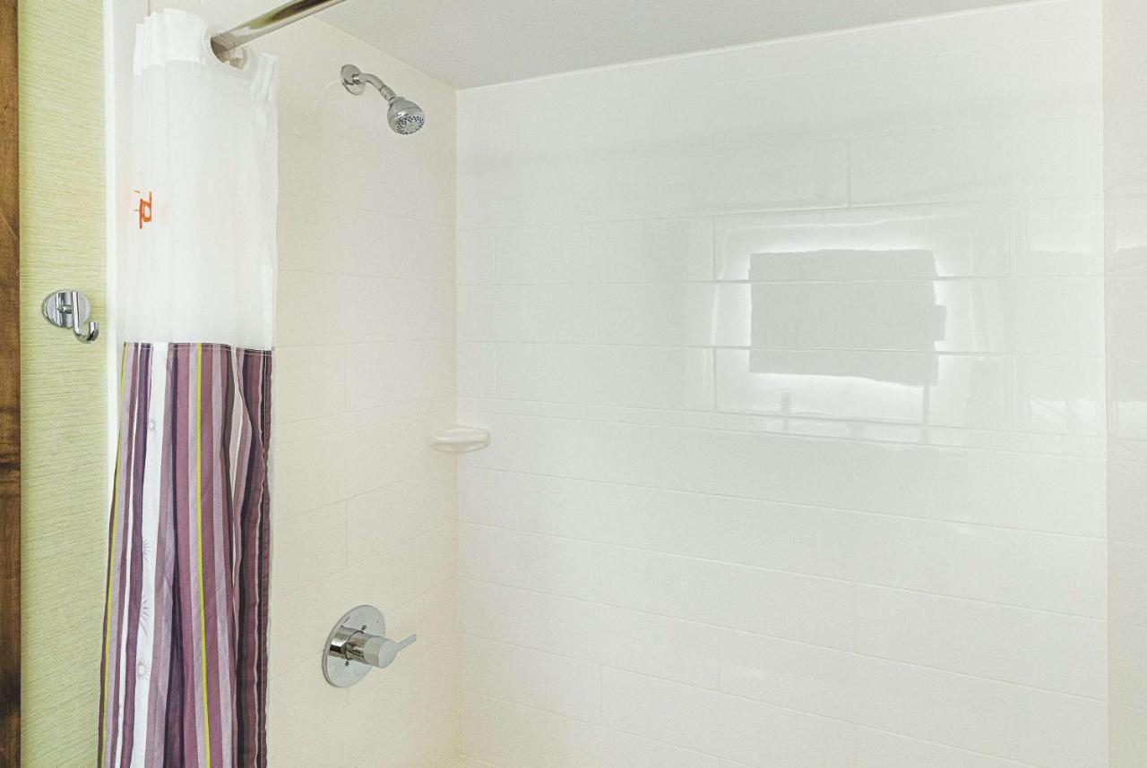 Deluxe Queen Room with Two Queen Beds at La Quinta Inn & Suites by Wyndham Orange County Airport