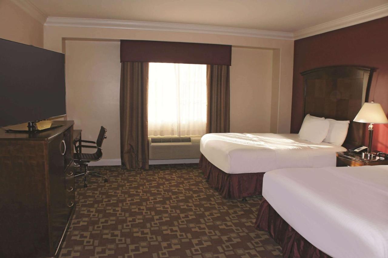 Queen Room with Two Queen Beds and Roll-In Shower - Mobility/Hearing Accessible - Non-Smoking at La Quinta Inn & Suites by Wyndham Moreno Valley