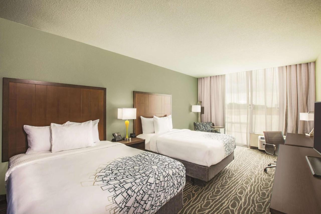 Queen Room with Two Queen Beds and Mobility/Hearing Access - Non-Smoking at La Quinta Inn & Suites by Wyndham Wichita Northeast