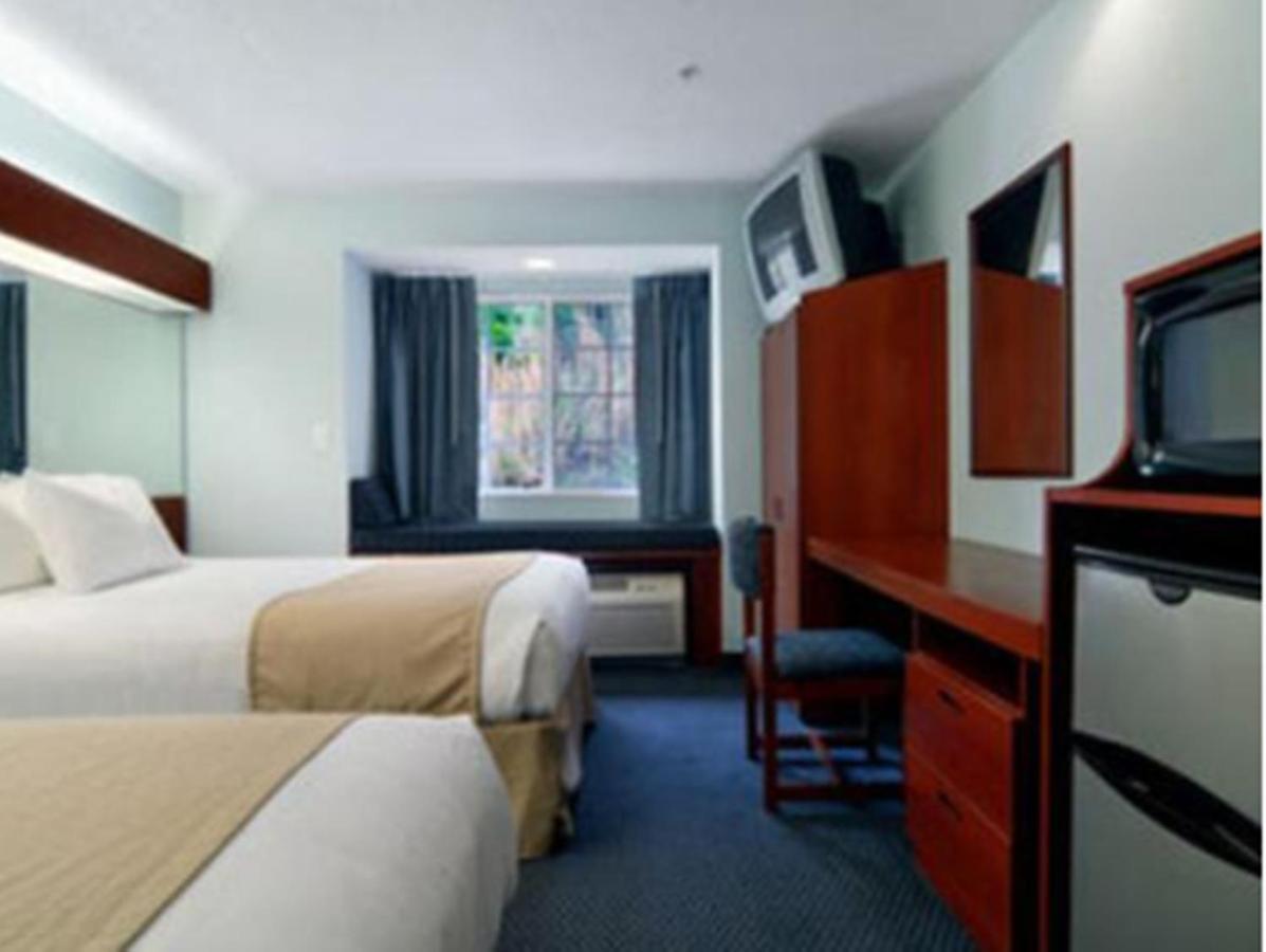Queen Room with Two Queen Beds - Non-Smoking at Microtel Inn & Suites by Wyndham Gardendale