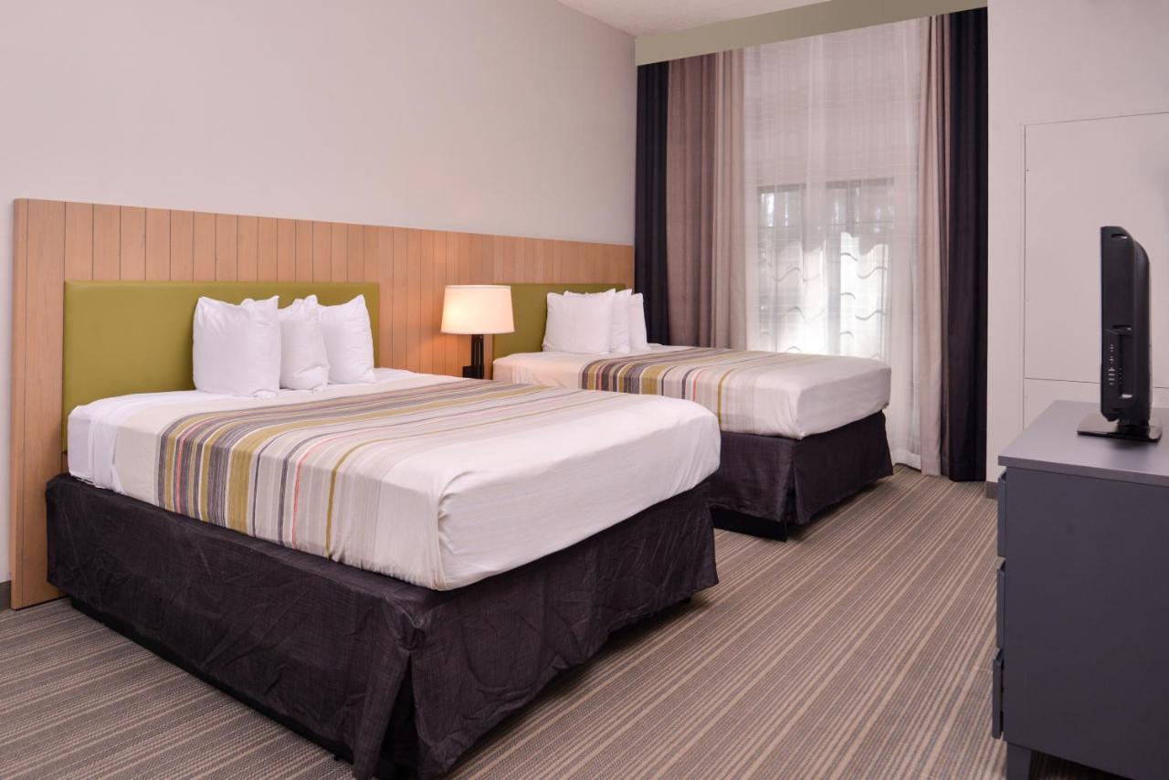Queen Room with Two Queen Beds - Non-Smoking at Country Inn & Suites by Radisson, Raleigh-Durham Airport, NC