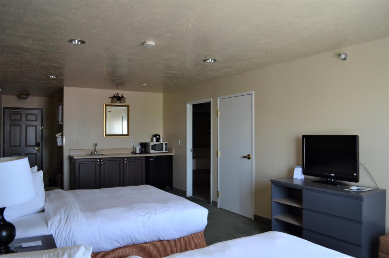 Queen Room with Two Queen Beds at Country Inn & Suites by Radisson, West Valley City, UT