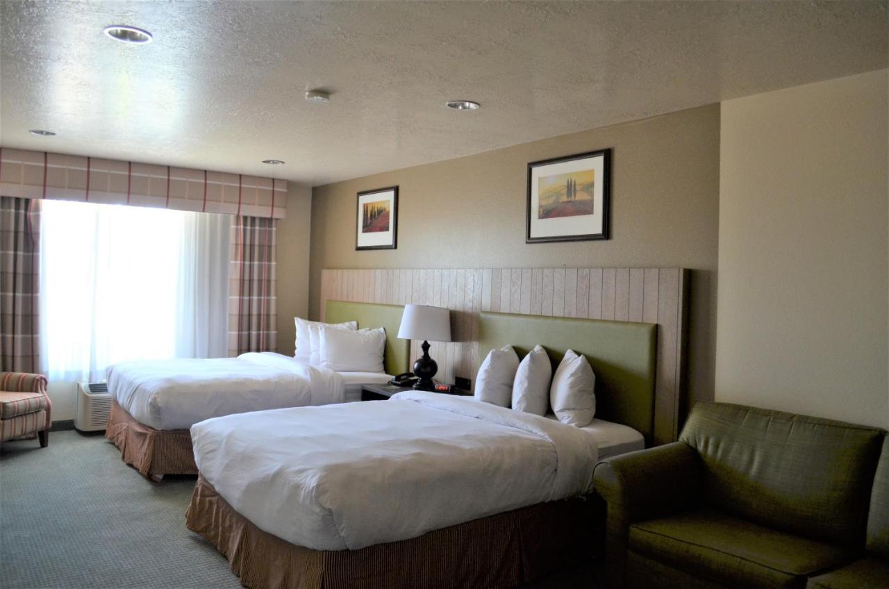 Queen Room with Two Queen Beds at Country Inn & Suites by Radisson, West Valley City, UT