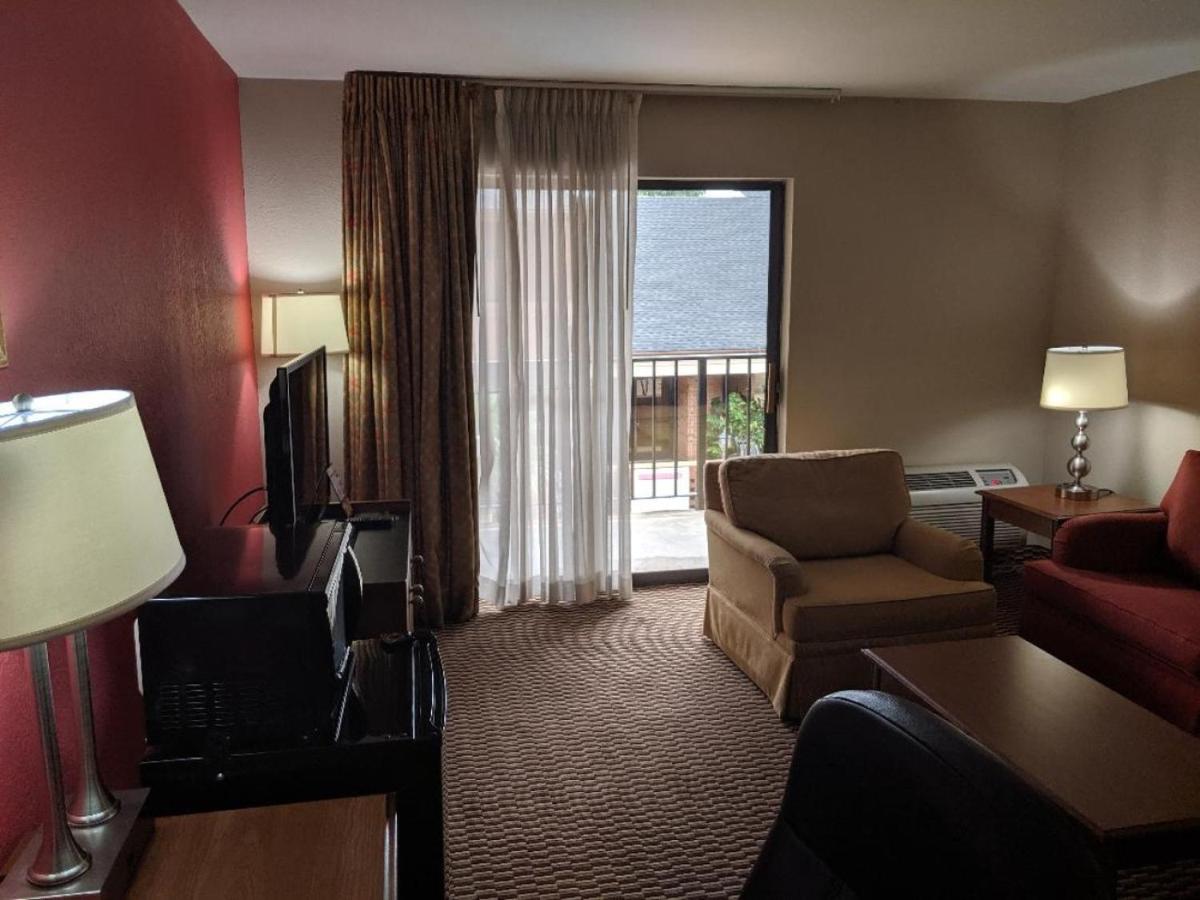 King Suite with Sofa at Ramada by Wyndham Raleigh