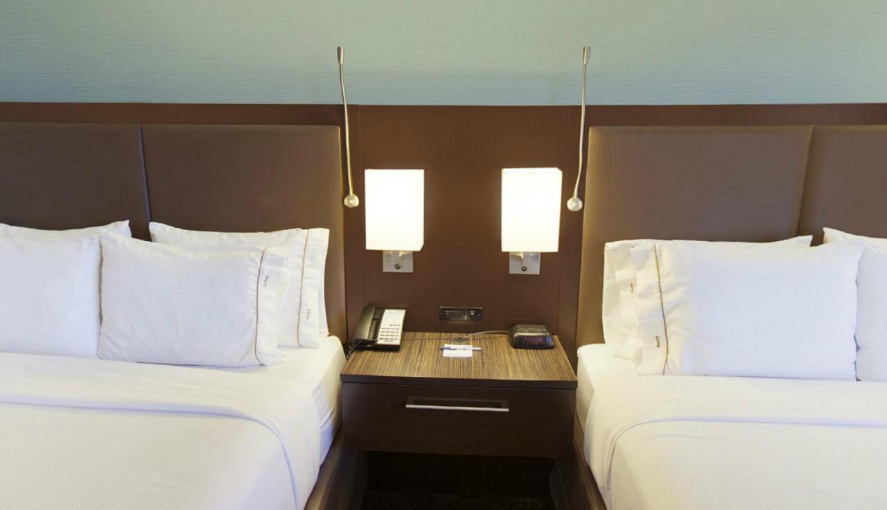 Queen Room with Two Queen Beds - Non-Smoking at Holiday Inn Express Romulus / Detroit Airport by IHG