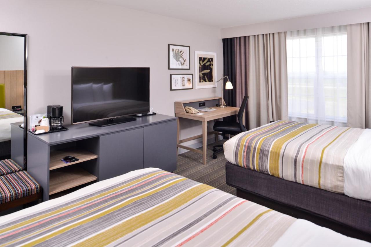 Queen Room with Two Queen Beds at Country Inn & Suites by Radisson, Tinley Park, IL
