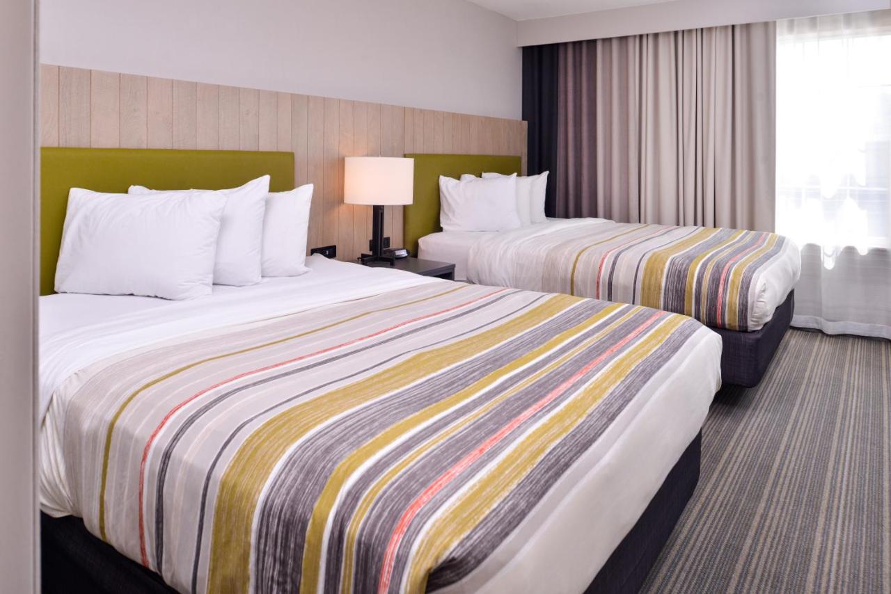Queen Room with Two Queen Beds at Country Inn & Suites by Radisson, Tinley Park, IL