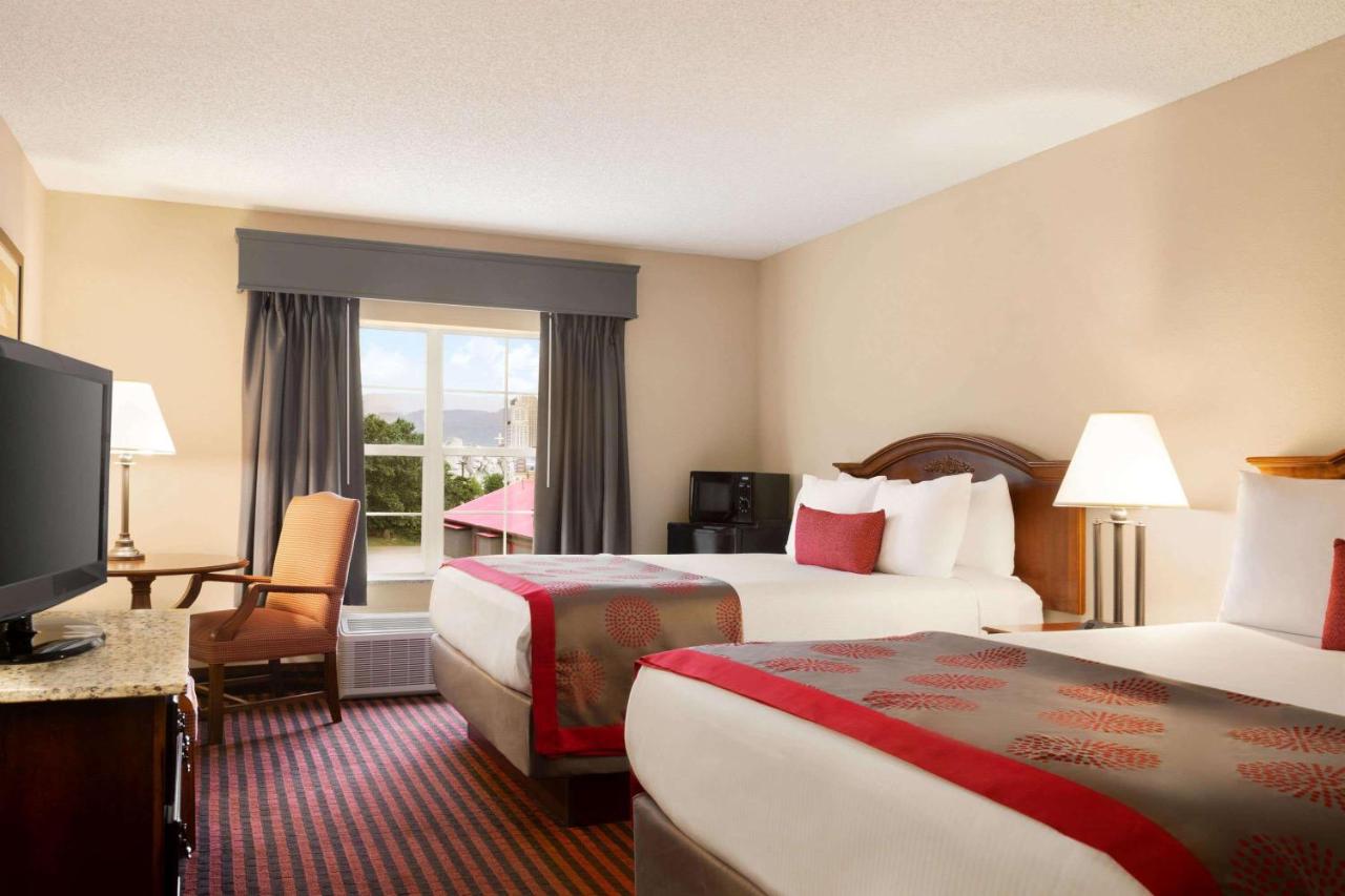 Queen Room with Two Queen Beds - Non Smoking at Ramada by Wyndham Pigeon Forge North