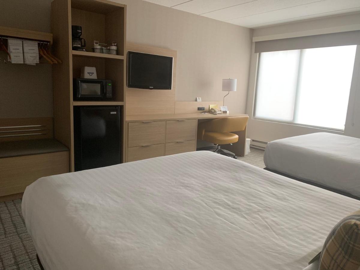 Queen Room with Two Queen Beds - Non-Smoking at Days Inn & Suites by Wyndham Duluth by the Mall