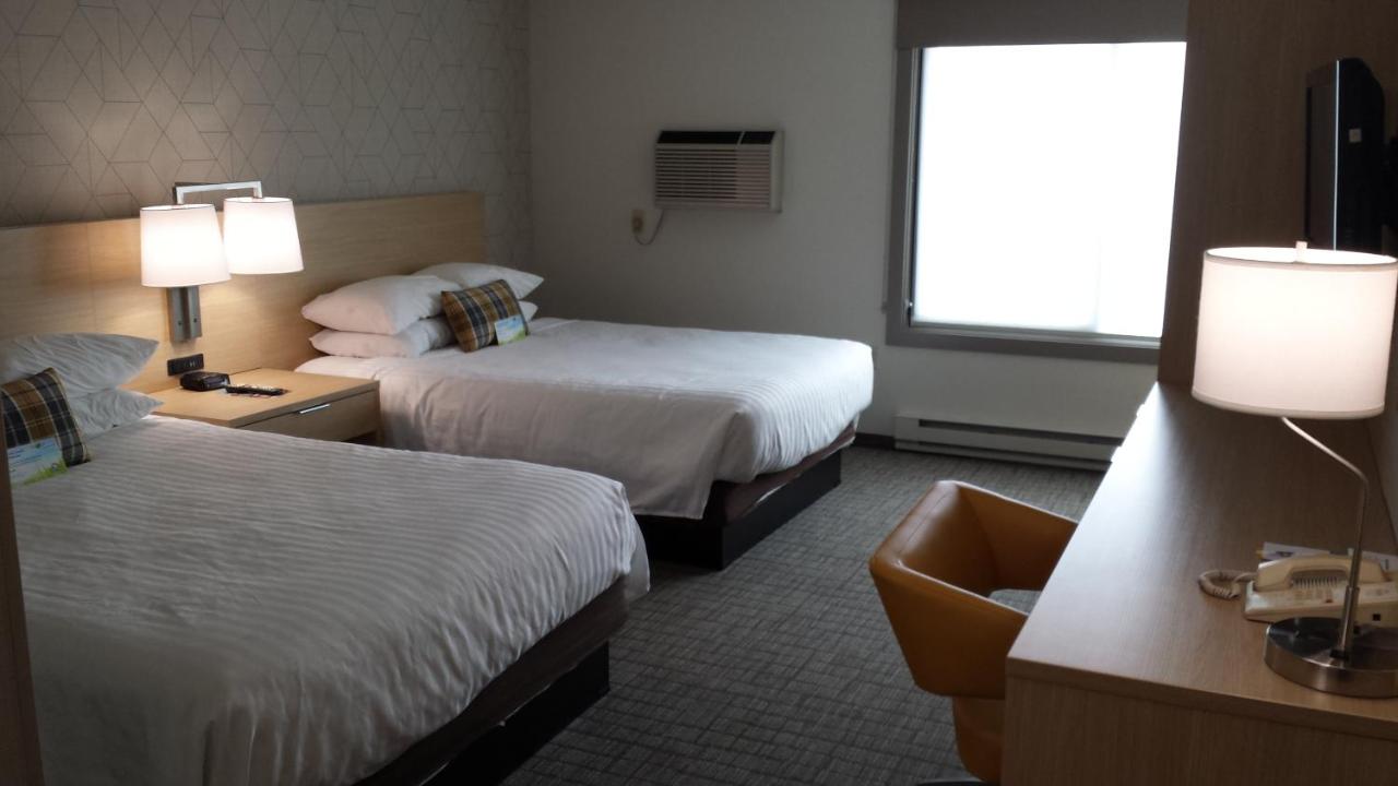 Queen Room with Two Queen Beds - Non-Smoking at Days Inn & Suites by Wyndham Duluth by the Mall