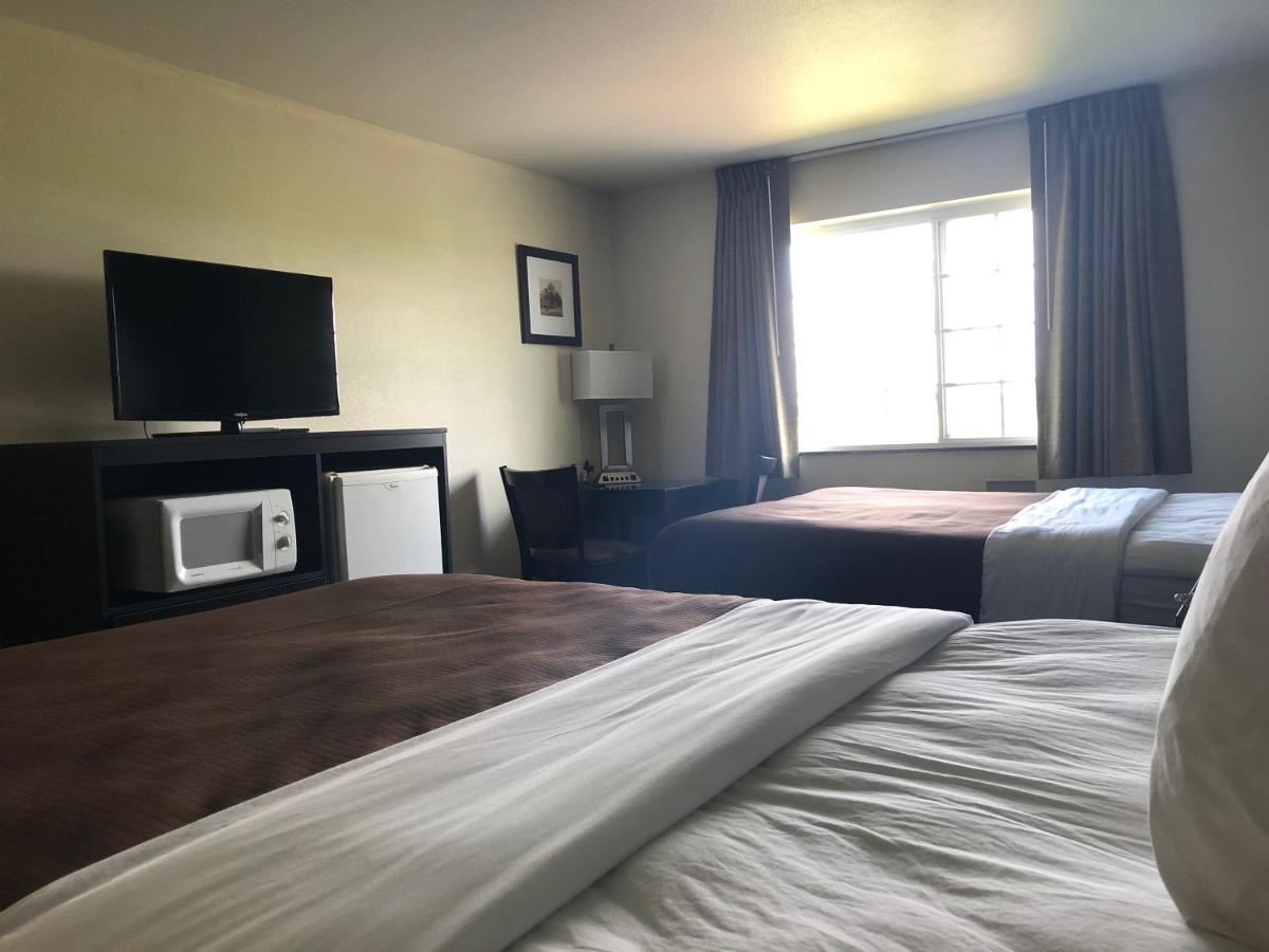Queen Room with Two Queen Beds - Mobility Access/Non-Smoking at AmericInn by Wyndham Maquoketa