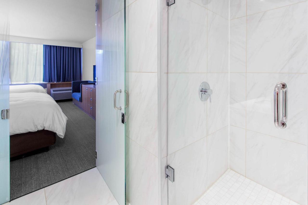 Queen Room with Two Queen Beds and Garden View - Non-Smoking at West Wing Hotel, an Ascend Hotel Collection Member
