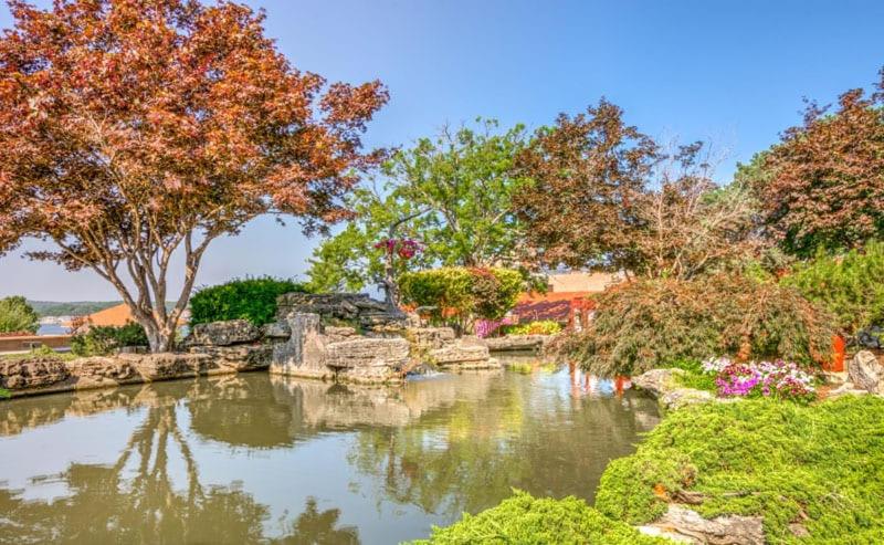 King Room with Garden View at Lodge Of Four Seasons Golf Resort, Marina & Spa