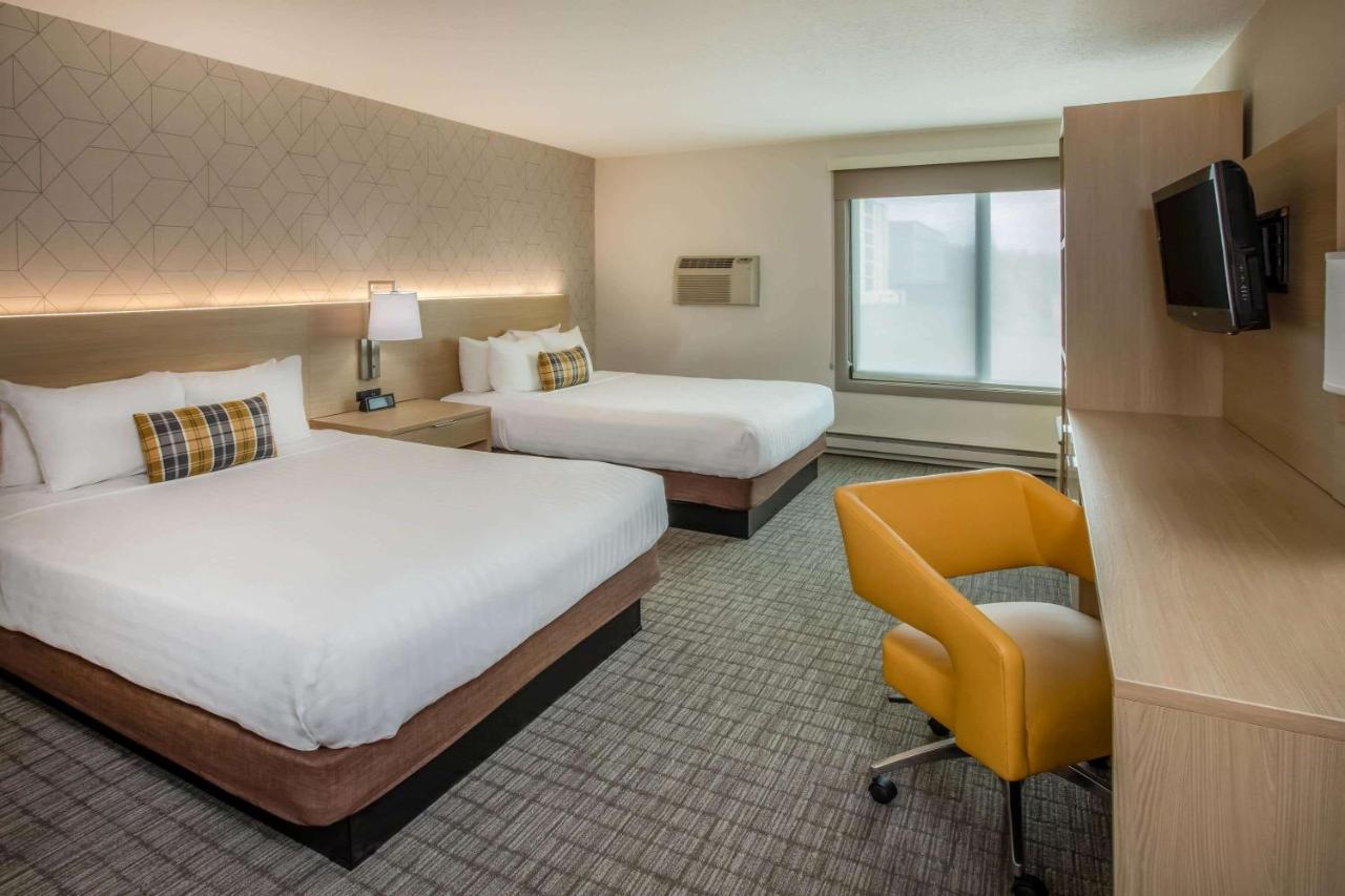 Queen Room with Two Queen Beds - Non-Smoking at Days Inn & Suites by Wyndham Duluth by the Mall