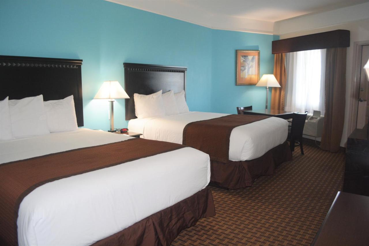 Queen Room with Two Queen Beds and View at Baymont by Wyndham Galveston