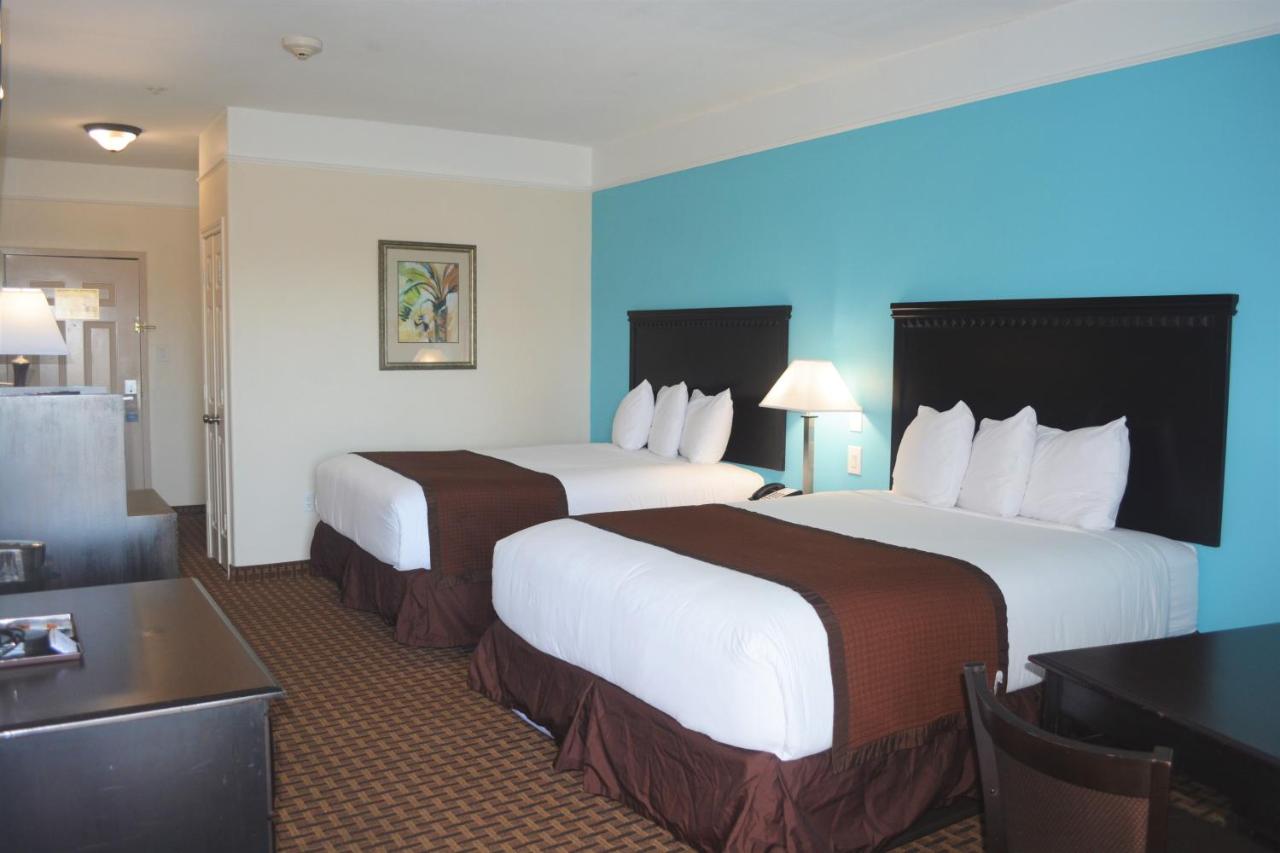 Queen Room with Two Queen Beds and View at Baymont by Wyndham Galveston