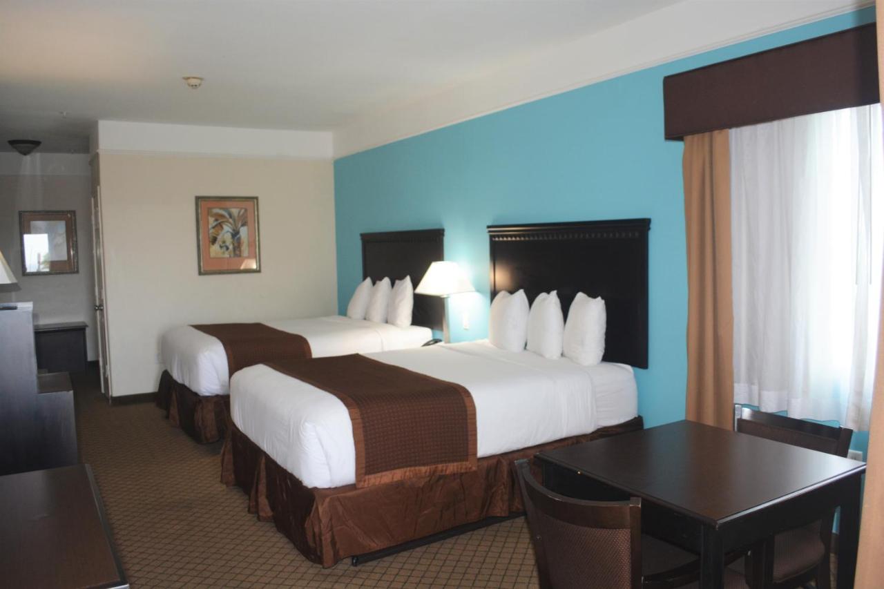 Queen Room with Two Queen Beds and View at Baymont by Wyndham Galveston