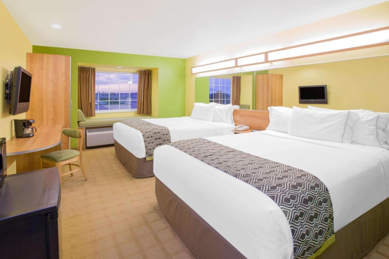 Deluxe Queen Room with Two Queen Beds- Disability Access - Non-Smoking at Microtel Inn & Suites by Wyndham Delphos