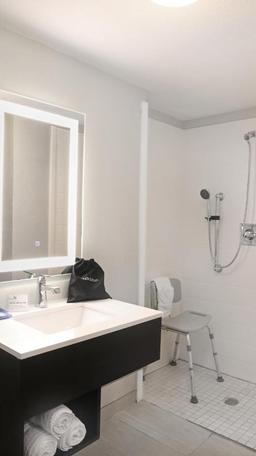 Standard Queen Room with Two Queen Beds and Mobility Accessible Tub at Holiday Inn Express New Orleans East by IHG