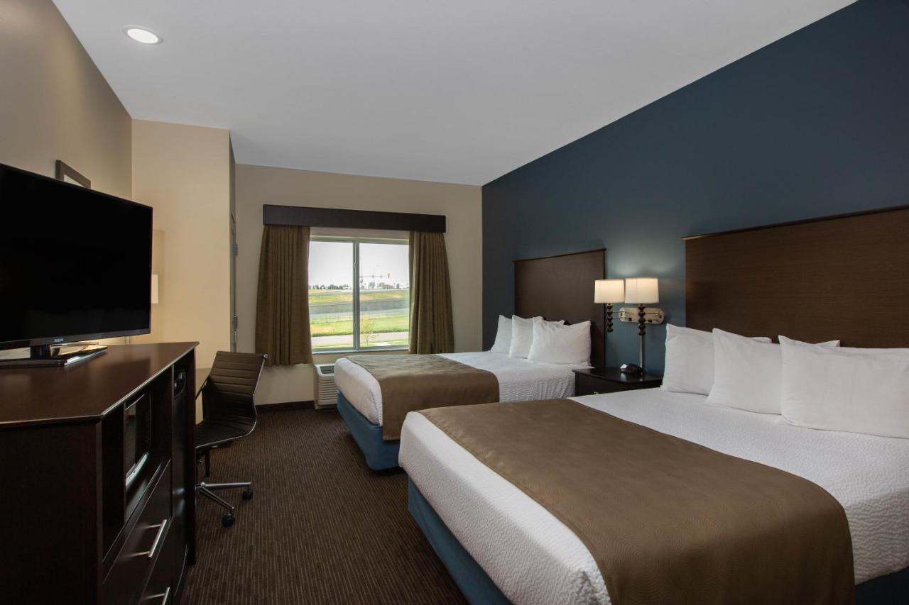 Queen Room with Two Queen Beds- Mobility and Hearing Impaired Access/Non-Smoking at AmericInn by Wyndham Sioux Falls North