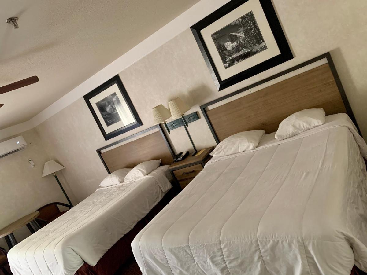 Queen Room with Two Queen Beds with Mountain View at Yosemite View Lodge