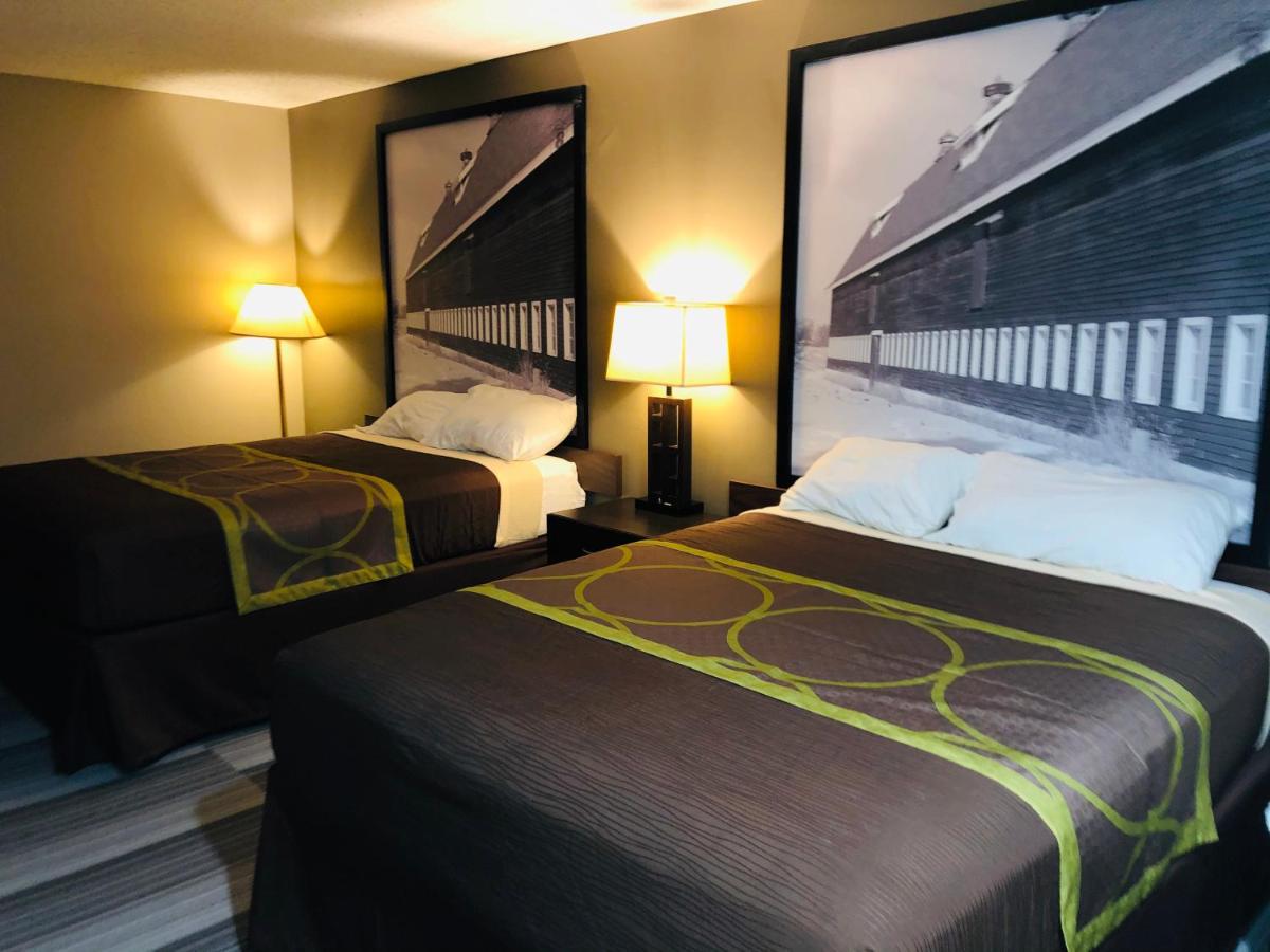 Queen Room with Two Queen Beds - Smoking at The Inn & Suites SW Omaha