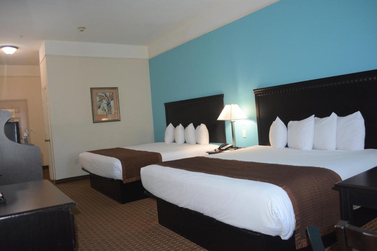 King Room with Two King Beds at Baymont by Wyndham Galveston