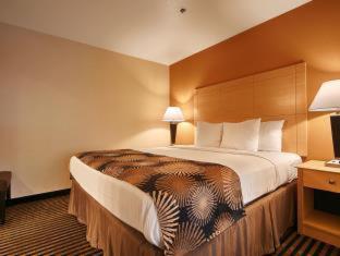 Room #54889916 at Best Western Palm Court Inn