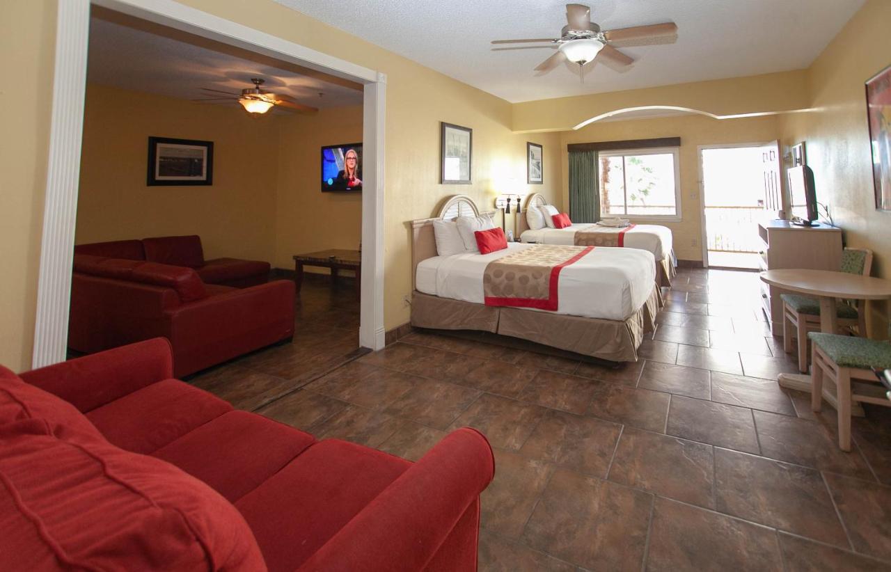 Superior Queen Room with Three Queen Beds - Non-Smoking at Ramada by Wyndham & Suites South Padre Island