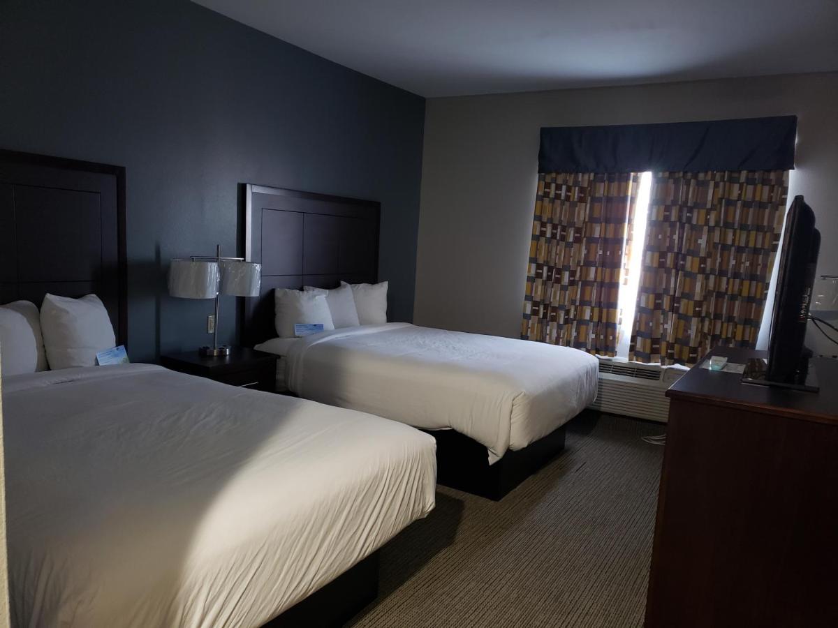 Queen Room with Two Queen Beds - Mobility Access/Non-Smoking at Days Inn & Suites by Wyndham Cleburne TX