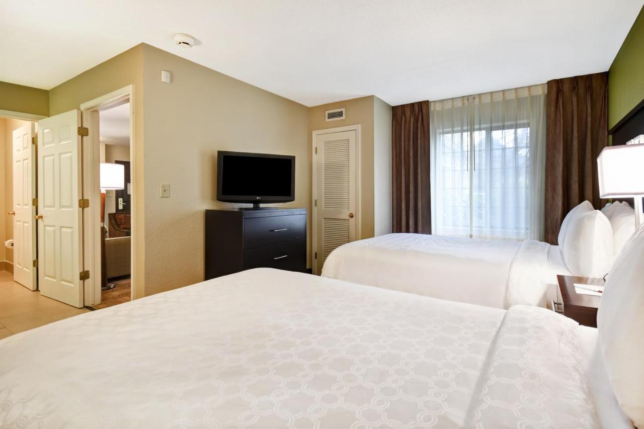 Two-Bedroom Suite with One Queen and Two Double Beds at Staybridge Suites Grand Rapids-Kentwood by IHG