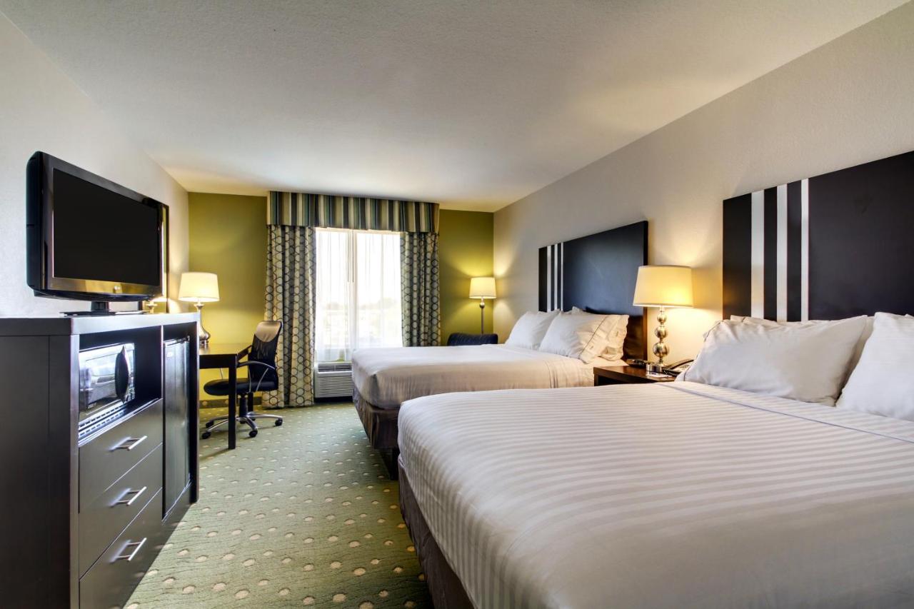 Queen Room with Two Queen Beds at Holiday Inn Express Hotel & Suites LIVE OAK, an IHG Hotel