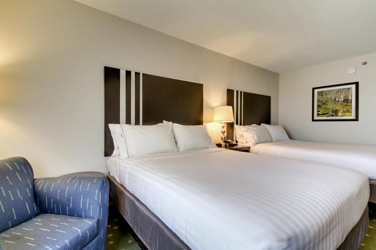 Queen Room with Two Queen Beds at Holiday Inn Express Hotel & Suites LIVE OAK, an IHG Hotel