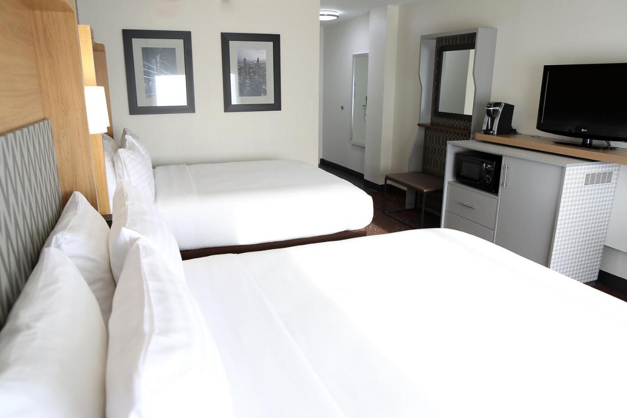 Queen Room with Two Queen Beds - Non-Smoking at Holiday Inn Chicago O'Hare Area by IHG