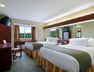 Queen Room with Two Queen Beds - Non-Smoking at Microtel Inn & Suites by Wyndham Gassaway/Sutton