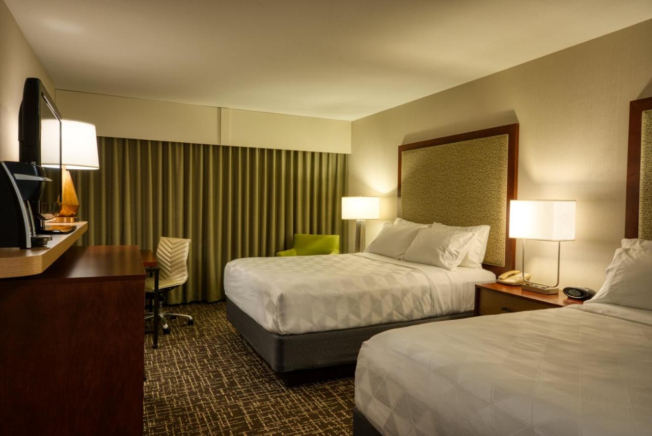 Queen Room with Two Queen Beds and Pool View at Holiday Inn Hotel & Suites Minneapolis - Lakeville by IHG
