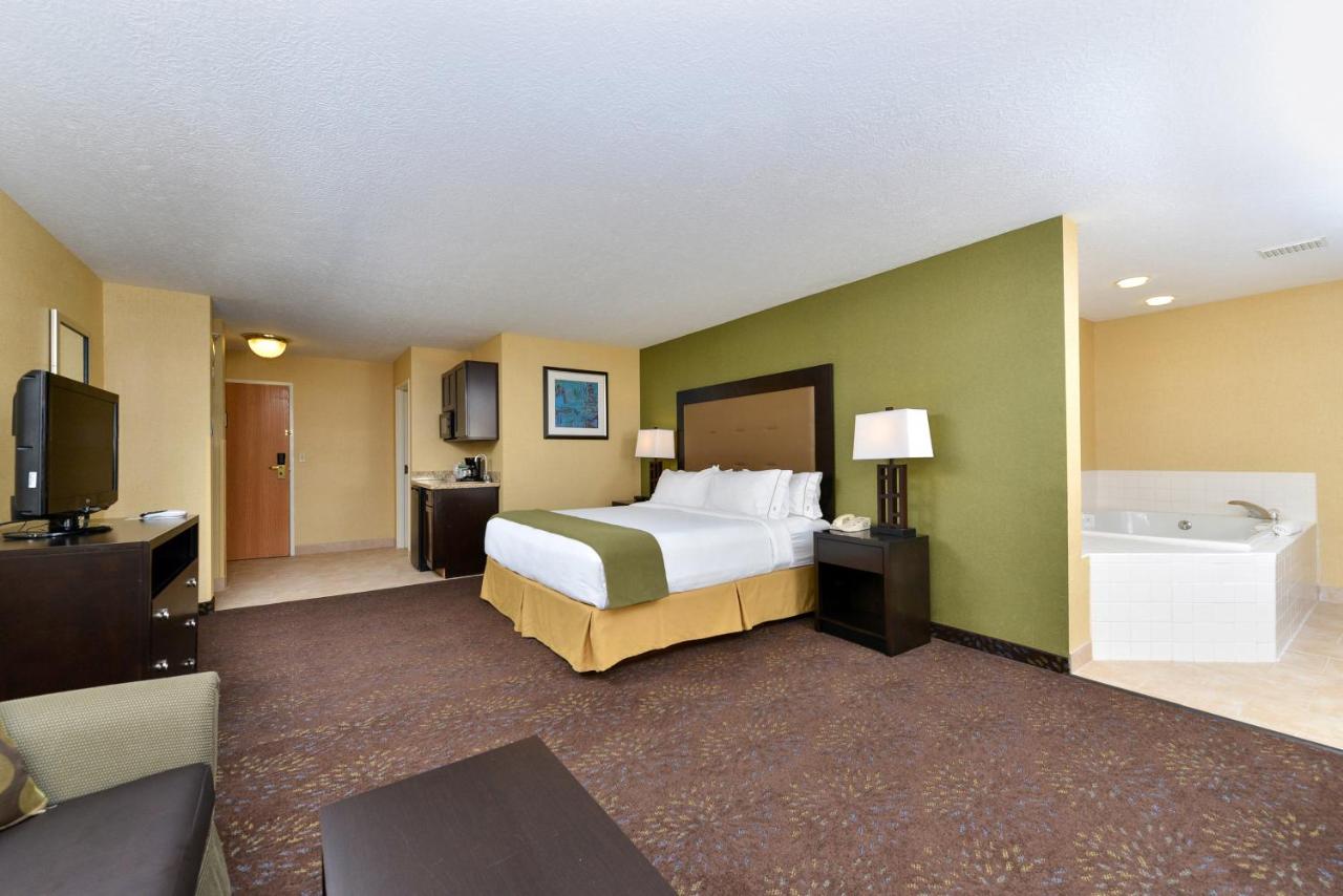 King Suite with Spa Bath at Holiday Inn Express Hotel & Suites Charlotte, an IHG Hotel
