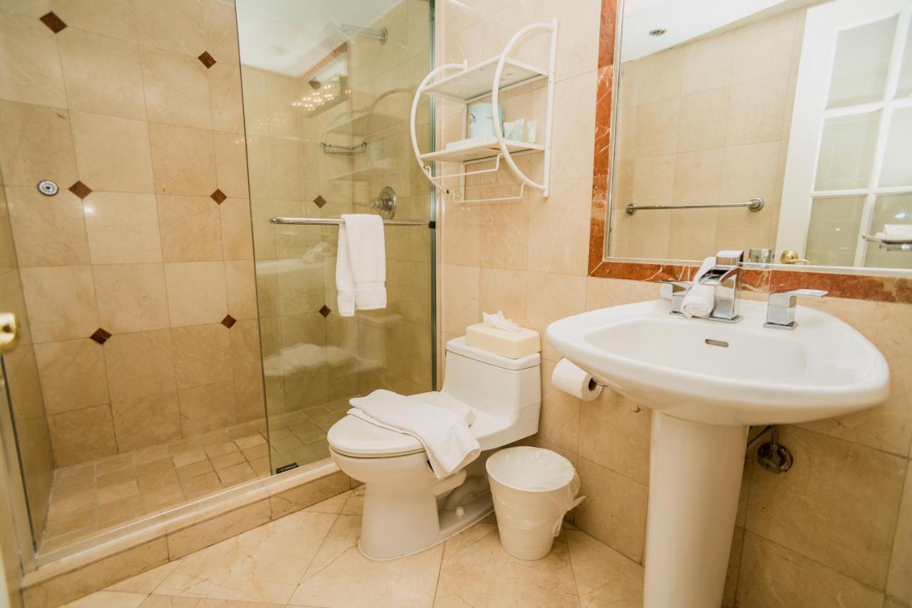 Signature Two-Bedroom 1 King + 2 Twin Beds at Alexander by Design Suites