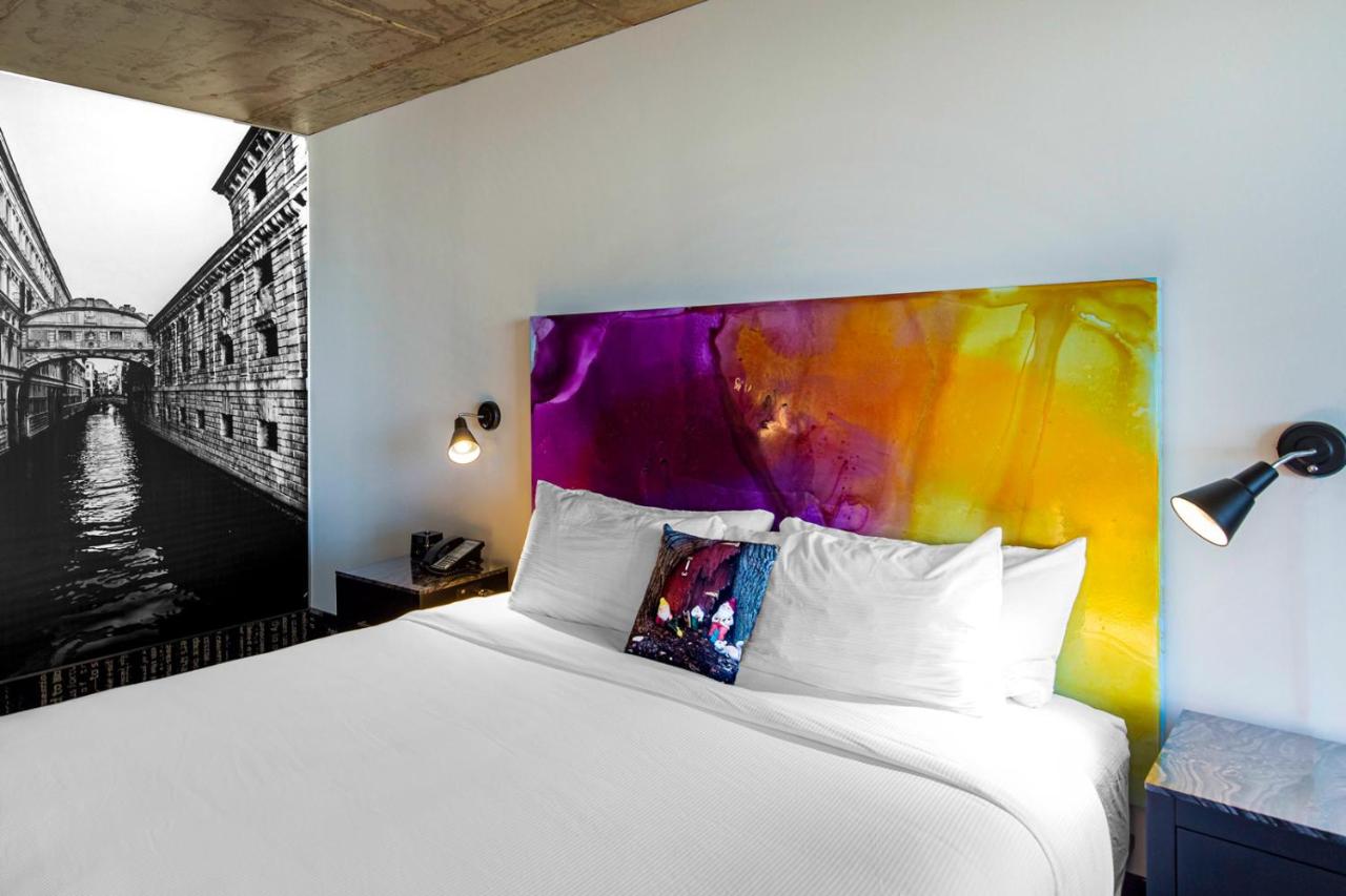 Corner Double Queen Suite at Lorenzo Hotel Dallas, Tapestry Collection by Hilton