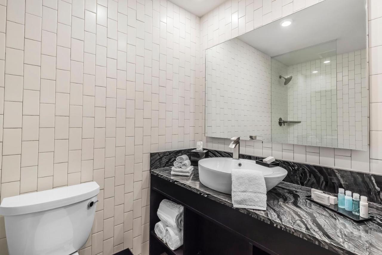 Corner Double Queen Suite at Lorenzo Hotel Dallas, Tapestry Collection by Hilton