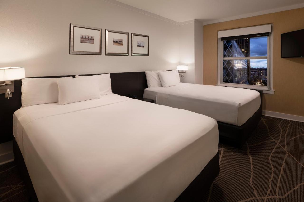Superior Two Double Beds at Executive Hotel Pacific