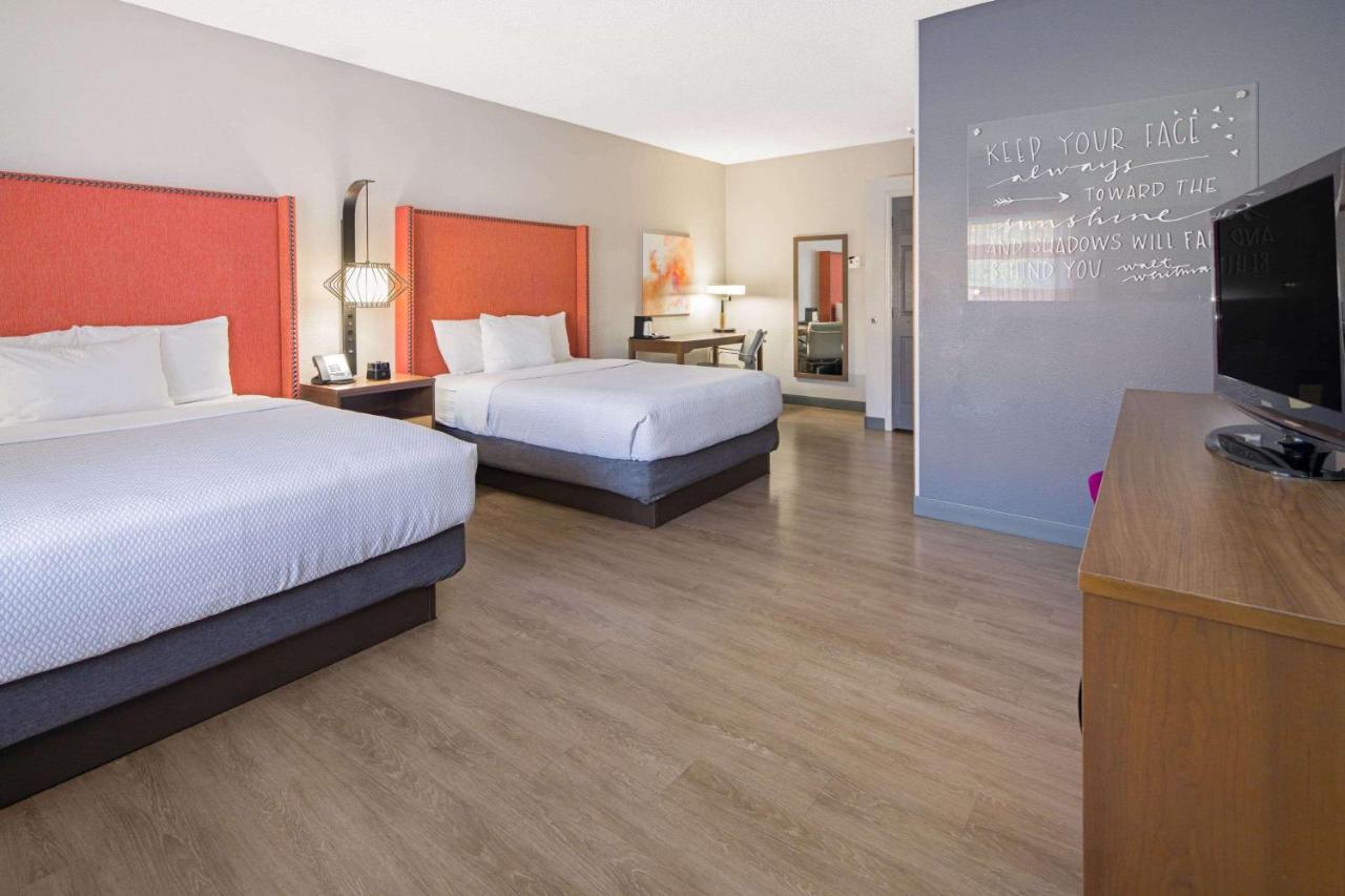 Deluxe Queen Room with Two Queen Beds at La Quinta Inn & Suites by Wyndham Orange County Airport