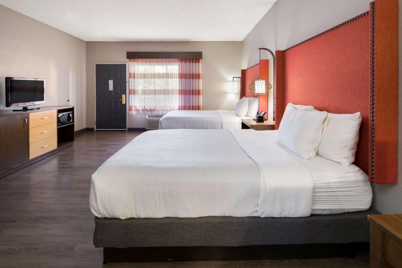 Deluxe Queen Room with Two Queen Beds at La Quinta Inn & Suites by Wyndham Orange County Airport