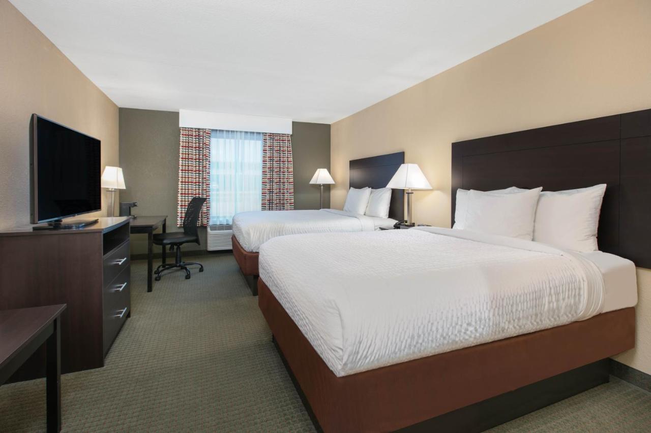 Queen Room with Two Queen Beds - Non-Smoking at Days Inn & Suites by Wyndham Florence/Jackson Area