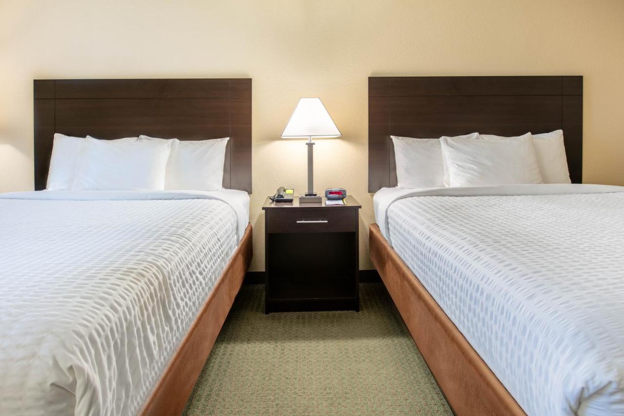 Queen Room with Two Queen Beds - Non-Smoking at Days Inn & Suites by Wyndham Florence/Jackson Area