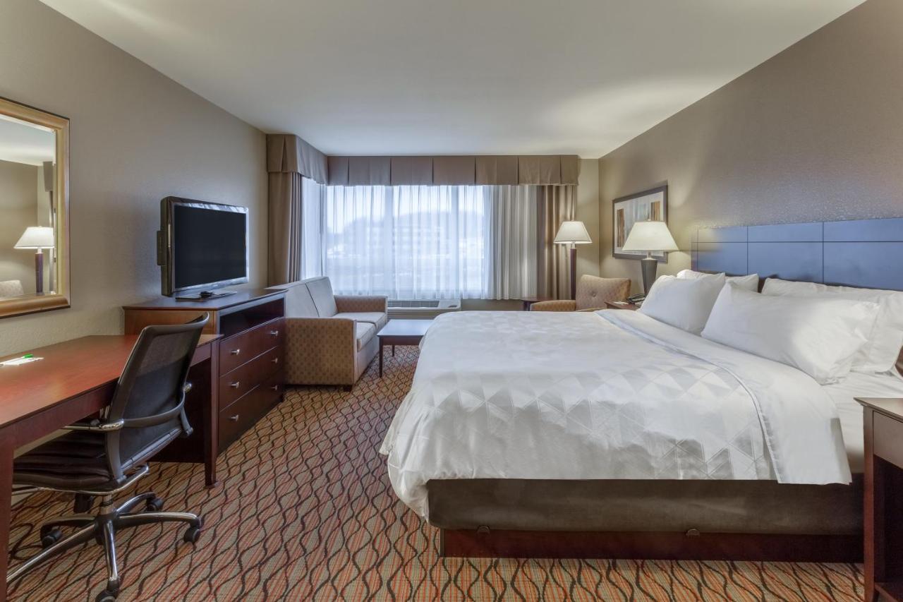 King Room - Hearing Accessible - Roll-in Shower at Holiday Inn Eau Claire South I-94 by IHG