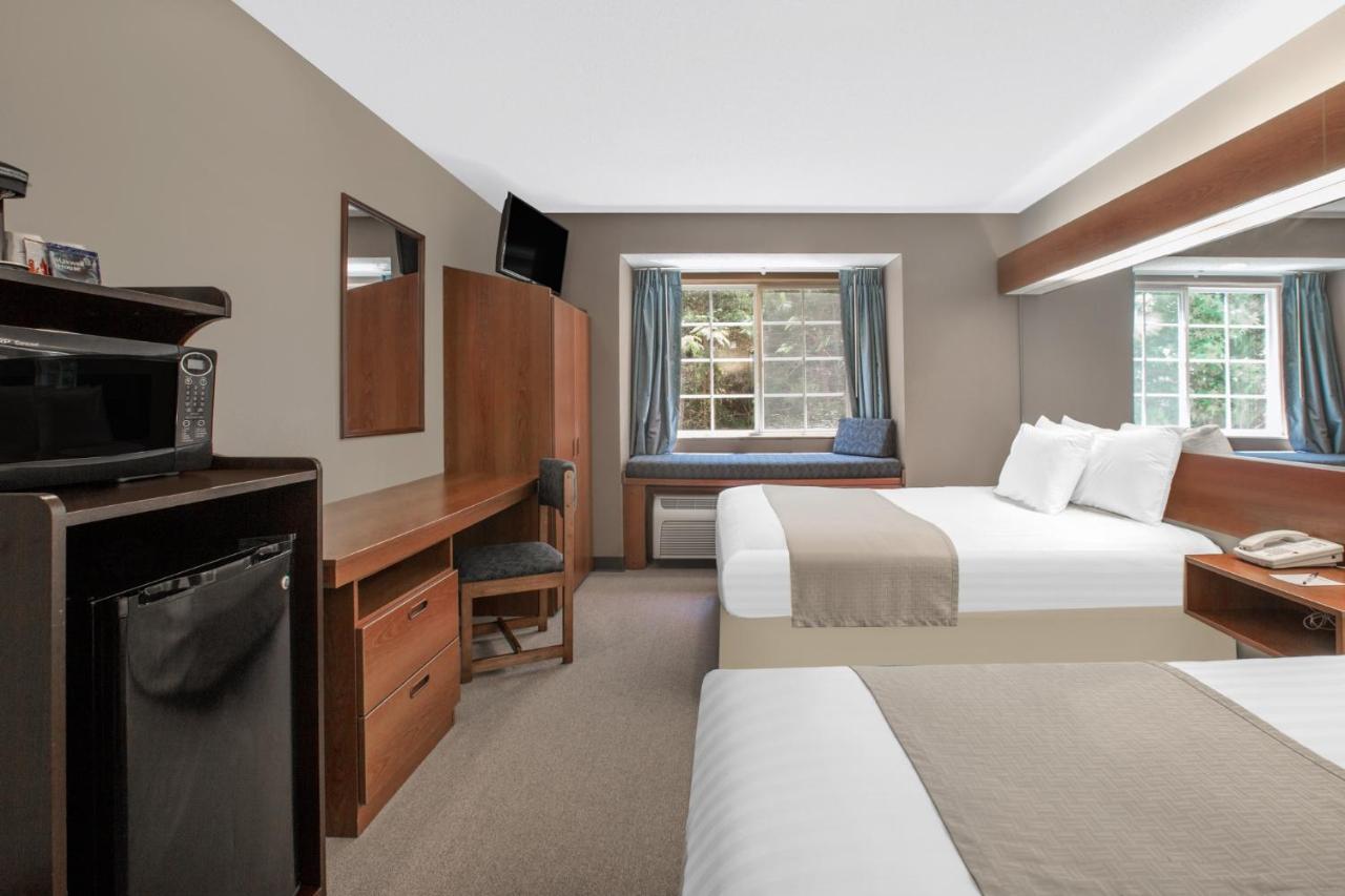 Queen Room with Two Queen Beds - Non-Smoking at Microtel Inn & Suites by Wyndham Gardendale