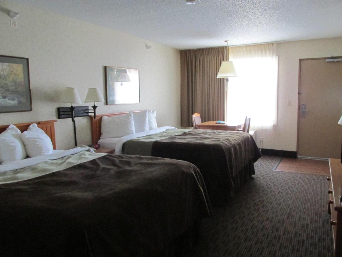 Standard Queen Room with Two Queen Beds at Kelly Inn & Suites Mitchell South Dakota