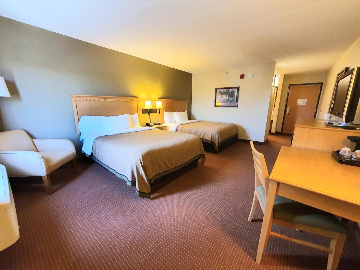 Executive Queen Room with Two Queen Beds at AmeriVu Inn & Suites - Waconia